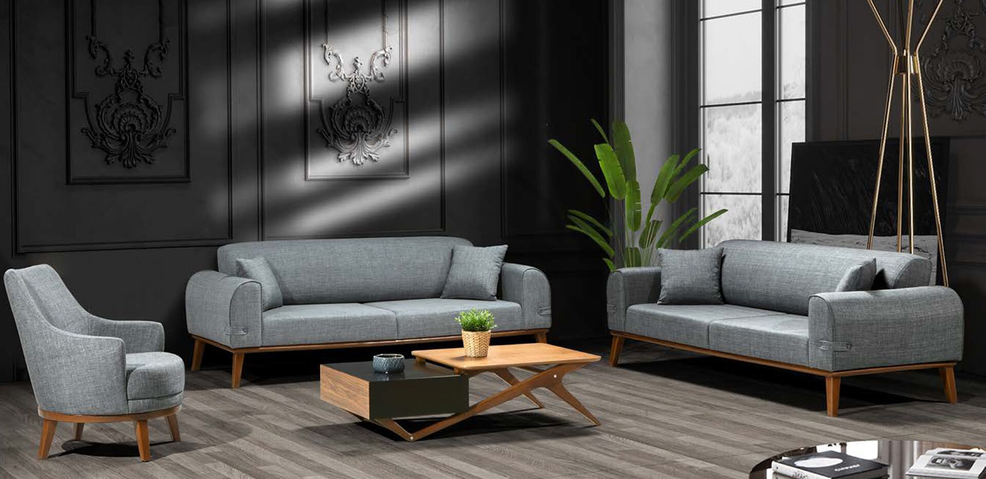 CK Home Mobilya atölyesinde üretilen gri kumaş koltuk takımı, koyu tonlu bir salonda